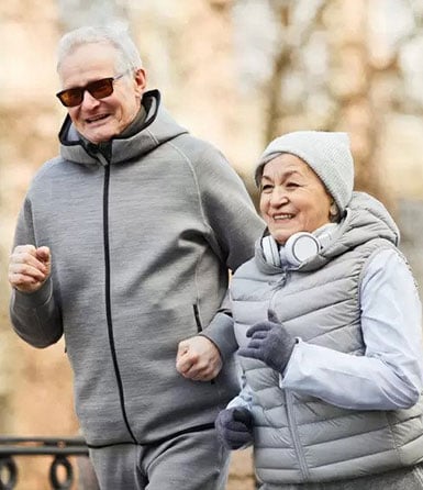 happy-senior-couple-running happy-senior-couple-running